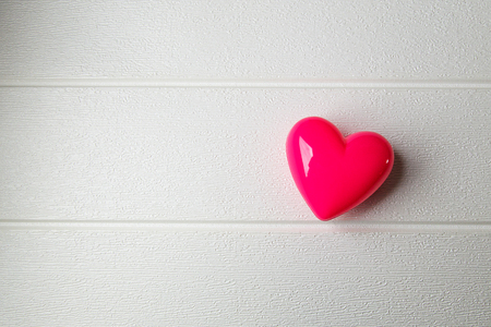 Heart on white wood background  image.の写真素材