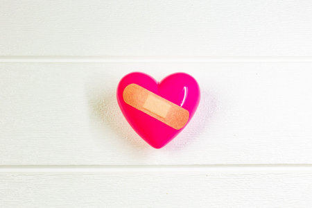 The pink Heart and hand for medical content.