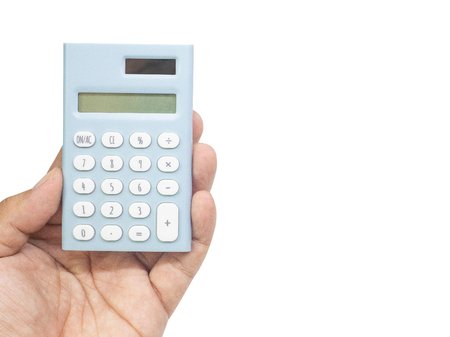 The blue calculator on hand white back ground  isolated image.の写真素材