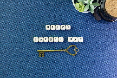 The wooden text  for father day content close up image.
