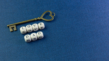 The wooden text  for father day content close up image.
