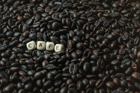 The coffee roasted and text wood cube close up image.の写真素材