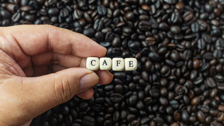 The coffee roasted and text wood cube close up image.