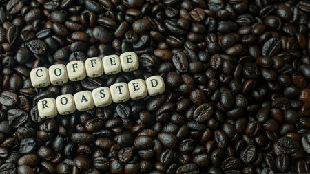 The coffee roasted and text wood cube close up image.の写真素材