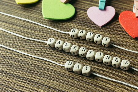 The  text wood cubes image for valentines day content.の写真素材