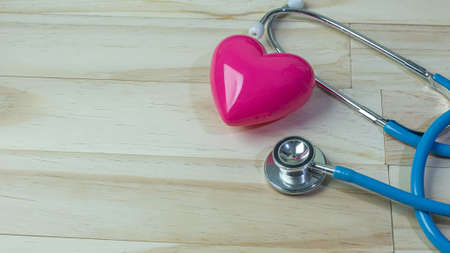 The Doctor stethoscope on wood  table for hospital and medicine content.の写真素材