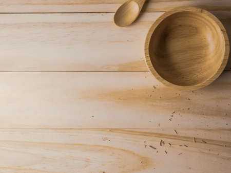 The wood bowl on wooden table for food content.の写真素材