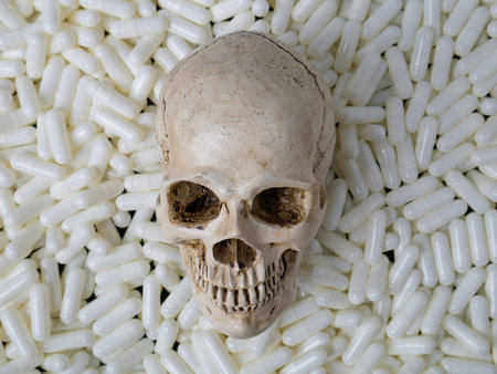skull  and white capsules image  for  sci or medical content.