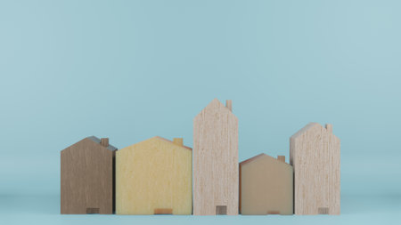 multi size  wooden homes toy on blue colour background 3d renderingの写真素材