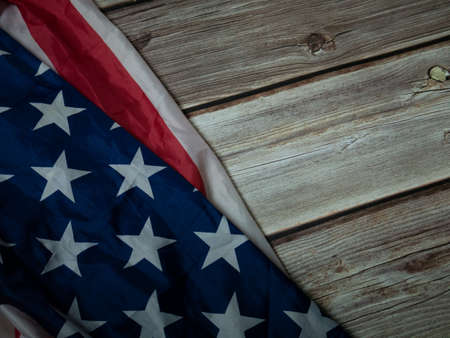 Flag of  United States of America  on natural wood table image for American freedom and Independence or Background with copy space concept.の写真素材