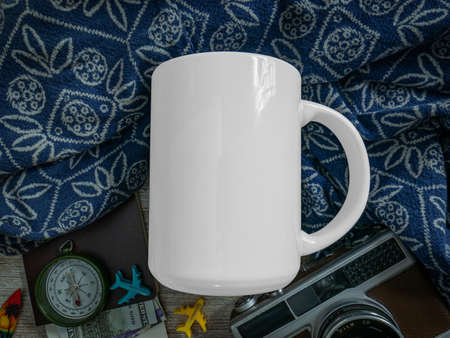 The white mug on table wood for mockup or backgroundの写真素材