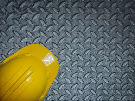 The Hard Hats Yellow Cap Mine Safety Appliances on  Checker Plateの写真素材