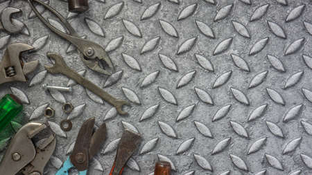 The tools  on Checker plate  for safety  or engineer concept.の写真素材