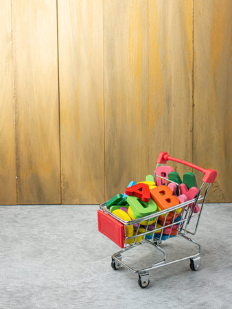 alphabet multi color in shopping cart  for education or marketing concept