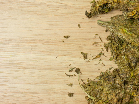 canabis on wood plate top view image for drug or medical conceptの写真素材