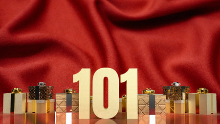 The gold number 101 and gift box on red silk for business conceptの写真素材