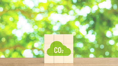 co2 icon  on wood cube for environmental or eco concept. co2 icon  on wood cube for global warming or carbon footprint conceptの写真素材