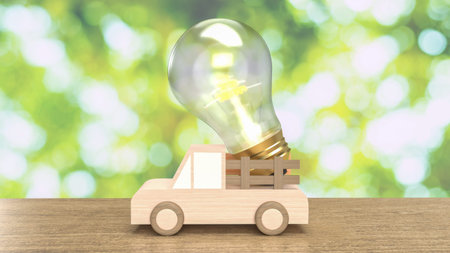 The wood truck and light bulb on wood table for eco concept, wood truck and light bulb on wood table  for ev car concept 3d imageの写真素材