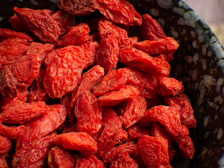 Goji on wood table for food or health concept