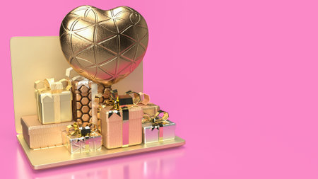 Gold laptop and gift box  for Technology or Shopping online conceptの写真素材