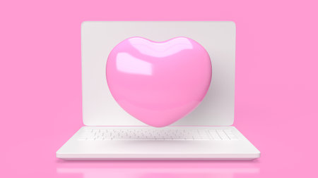 Laptop and pink hearth  for Technology or medical.の写真素材