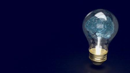 Just as a light bulb illuminates a dark room, a brain light bulb  can illuminate the mind, sparking new ideas, solutions, or perspectives. It represents a moment of creative inspiration or mental breakthrough.の写真素材