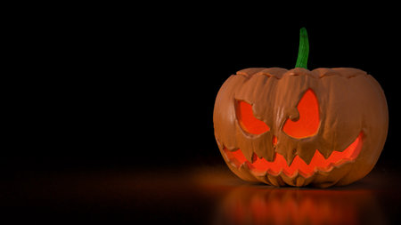 A jack o lantern is a carved pumpkin, turnip, or other root vegetable lantern associated with the Halloween holiday.の写真素材