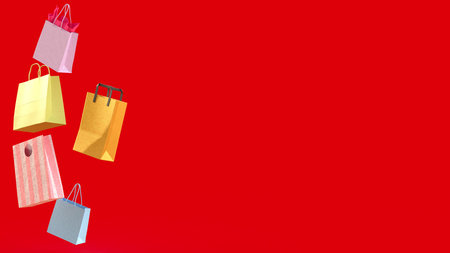 A shopping bag is a carry bag used by consumers to transport purchased goods from retail stores.の写真素材