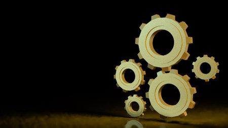 Gold gear in Black Background  for technology or Abstract  concept 3d rendering.の写真素材