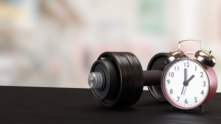 A dumbbell is a handheld weight used in strength training and fitness exercises to build muscle, tone, and endurance.の写真素材