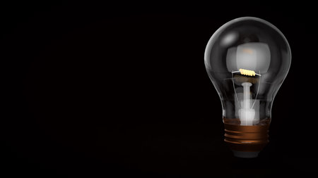 Light bulb on black background for Idea or Business concept 3d Rendering.の写真素材
