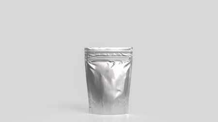 Blank silver foil pouch packaging mockup on gray background, metallic stand up bag for food, coffee, or product design template, clean and minimal branding concept.の写真素材