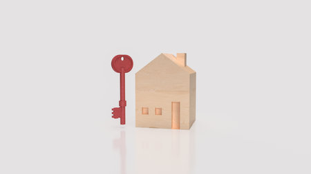 Wooden house model with red key on white background, symbolizing real estate investment, home ownership, mortgage, property finance, and saving for a new home.の写真素材