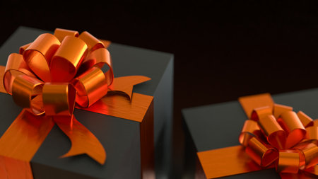 Luxury black gift boxes with shiny orange ribbons and bows, elegant holiday presents for celebration, Christmas, or special occasions, premium background with warm light.の写真素材