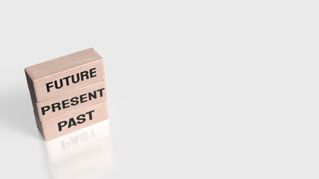 Wooden blocks labeled PAST, PRESENT, and FUTURE stacked vertically, representing time progression, planning, mindset, personal growth, and life direction.の写真素材