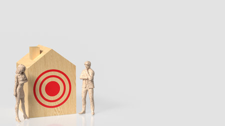 Two wooden style human figures stand beside a house with a red target symbol, representing real estate goals, buyer decisions, market strategy, or investment planning.の写真素材