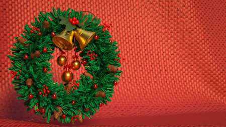 Green Christmas wreath with gold bells, red ornaments, berries, and pinecones on a warm textured red background, symbolizing holiday celebration, festive spirit, and seasonal decoration.の写真素材