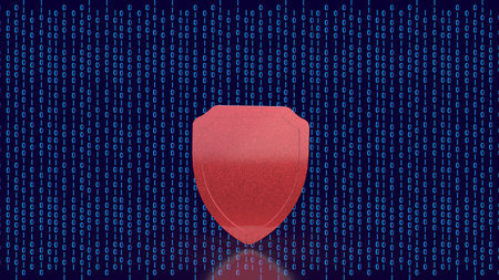 Red security shield over binary code background, symbolizing cybersecurity, data protection, digital privacy, encryption, and online safety in a modern tech environment.の写真素材