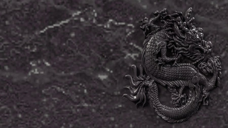 Intricate black dragon relief sculpture showcasing detailed scales and mythical elegance. Perfect for themes of Asian art, mythology, power, culture, and ornamental design.の写真素材