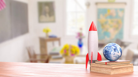 A colorful rocket and Earth globe placed on stacked books in a bright classroom, symbolizing education, creativity, exploration, learning inspiration, and imaginative STEM teaching concepts.の写真素材