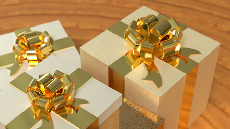 Golden and silver wrapped gift boxes with decorative bows on a warm gold surface, symbolizing...