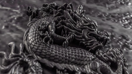 Intricate black dragon relief sculpture showcasing detailed scales and mythical elegance. Perfect...