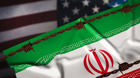 Iranian flag behind barbed wire with blurred United States flag background, symbolizing sanctions, political pressure, geopolitical tension, international conflict, nuclear dispute, and strained diplomatic relations.の写真素材