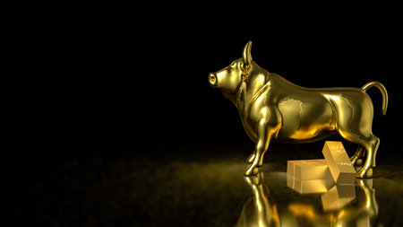 Golden bull statue with gold bars on dark background symbolizing bullish market investment wealth financial strength trading success and economic growthの写真素材