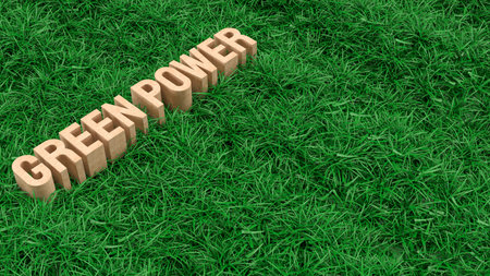 Wooden green power text standing on fresh grass representing renewable energy sustainability eco friendly power environmental awareness and clean energy conceptの写真素材