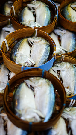 Mackerel fish in bamboo basket in market ,Thailand の写真素材