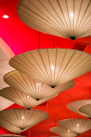 Gold and red japanese umbrella lamp for backgroundの写真素材
