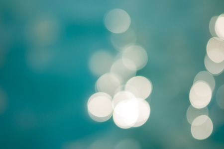 bright colorful sun and sea bokeh backgroundの写真素材