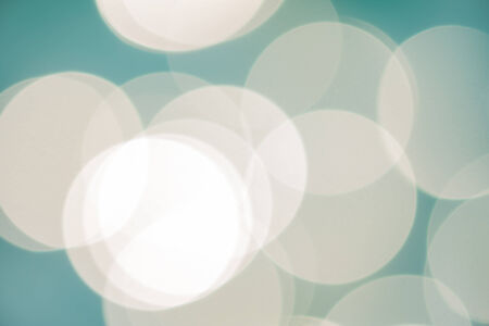 bright colorful sun and sea bokeh backgroundの写真素材