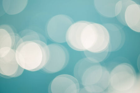 bright colorful sun and sea bokeh backgroundの写真素材